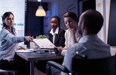 Quality engineering report in a conference room meeting