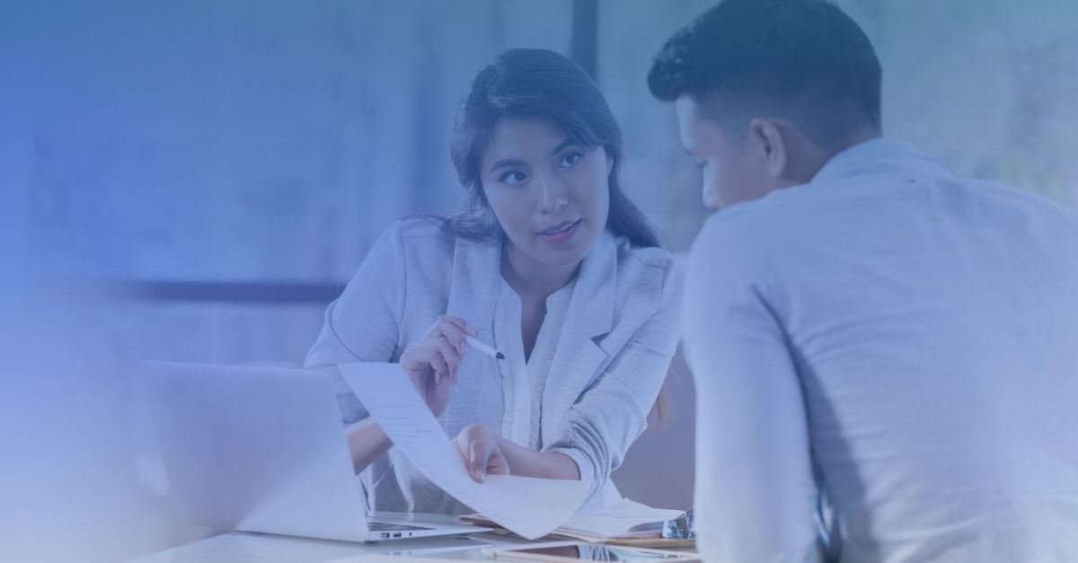 prior authorization modernization displayed with two clinical payer nurses discussing paperwork